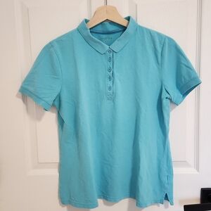 Teal golf tee
